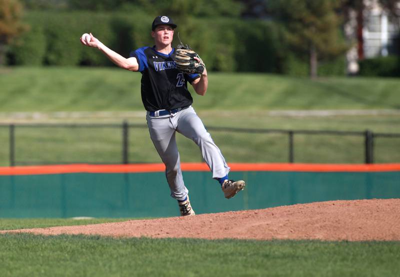 Geneva's Tate Beran throws to first during a game against St. Charles East on Tuesday, May 13, 2024 in St. Charles.