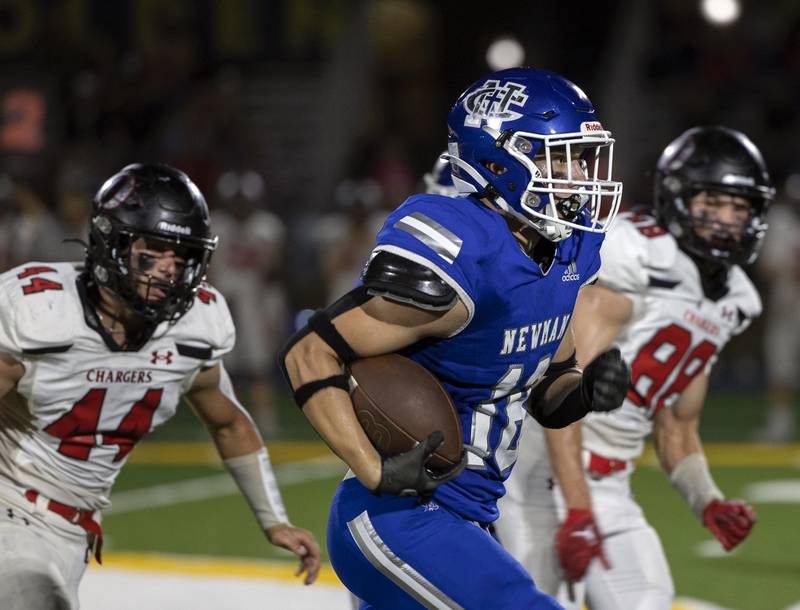 Newman’s Matthew Blackert runs for a touchdown against Orion Friday, Sept. 20, 2024, at Roscoe Eades Stadium in Sterling.