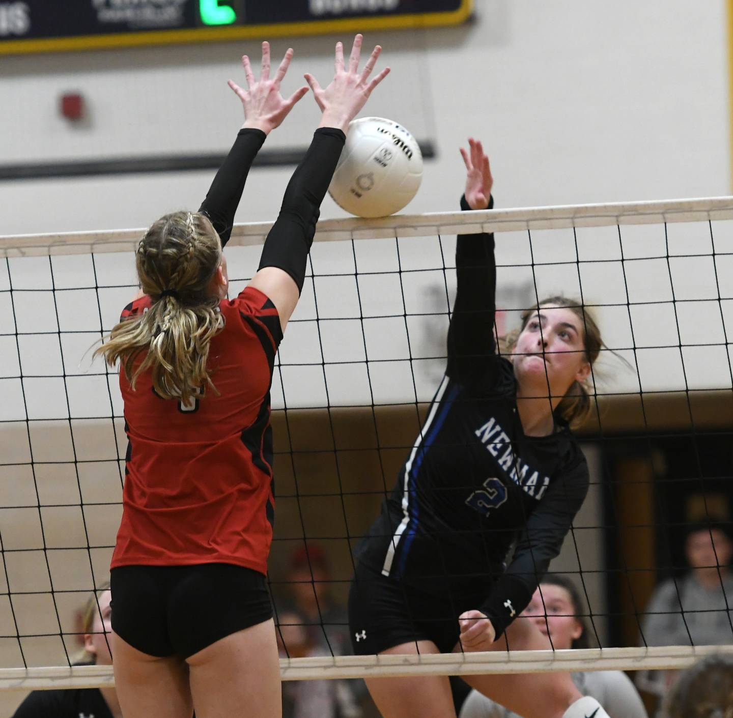 Newman's Sophia Ely and Fulton 's Ava Bowen battle at the net at the championship of the 1A Polo Regional on Thursday, Oct. 27, 2022.