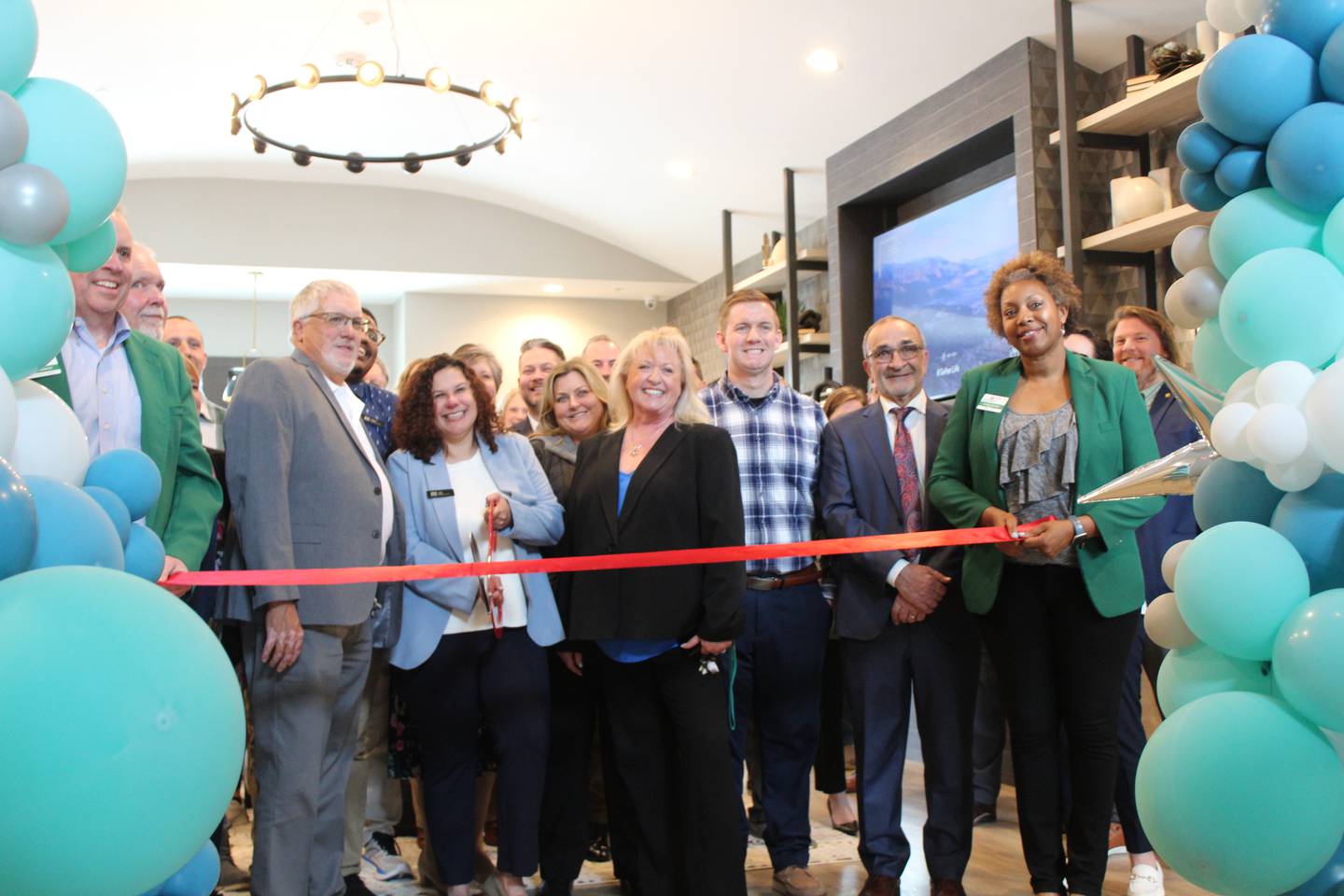 The Water's Edge team celebrates with a ribbon cutting ceremony with the Crystal Lake Chamber of Commerce on April 30, 2025.