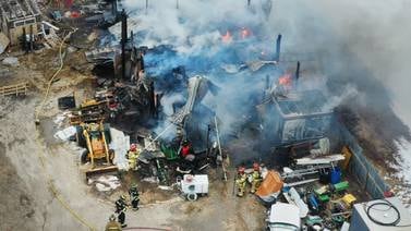 Photos: Massive blaze engulfs structure near Earlville