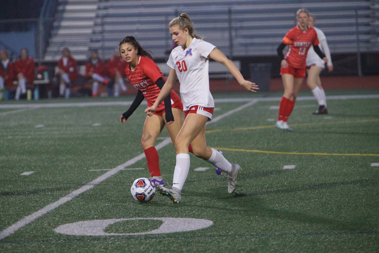 Marian Central's Adriana Wrzos looks to advance the ball against Huntley on Wednesday March 22, 2023 in Huntley.