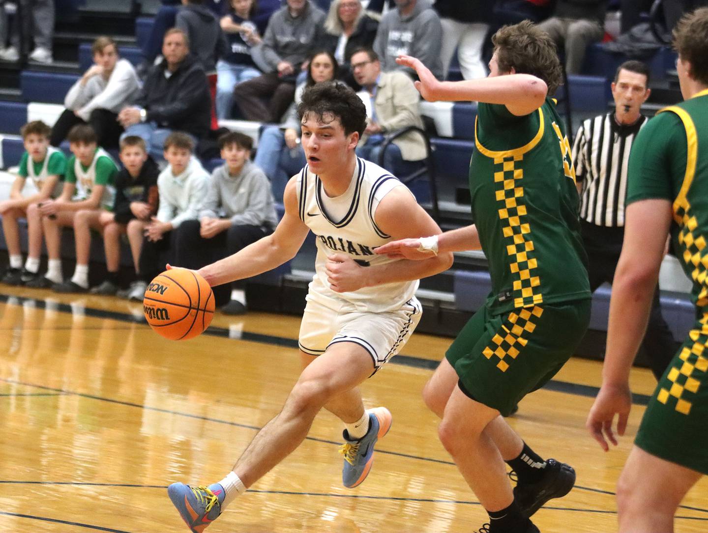 Cary-Grove’s Adam Bauer moves with the ball against Crystal Lake South in varsity boys basketball on Wednesday, Dec. 3, 2025, at Cary-Grove High School in Cary.