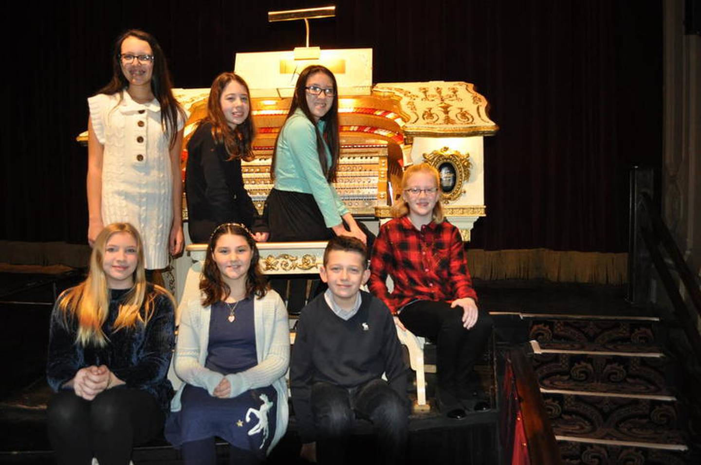 "Don't mess this up" and "This is such a great opportunity [that] I'm getting to play on this million dollar organ."

And then he struck the first notes.

The Lockport District 91 students who performed on the Rialto's Barton Grande Theatre Pipe Organ are (from left) front row: Sophie Ervin (eight grade), Laura Lee (fifth grade), Victor Cieslak-Kaczmarczk (sixth grade) and Anja Klauser (fifth grade); and back row: Lola Rodriguez (seventh grade), Evelyn Moan (seventh grade) and Allison Renehan (sixth grade). Not pictured are Henry McFerron (seventh grade) and Patrycja Mrowca (seventh grade).