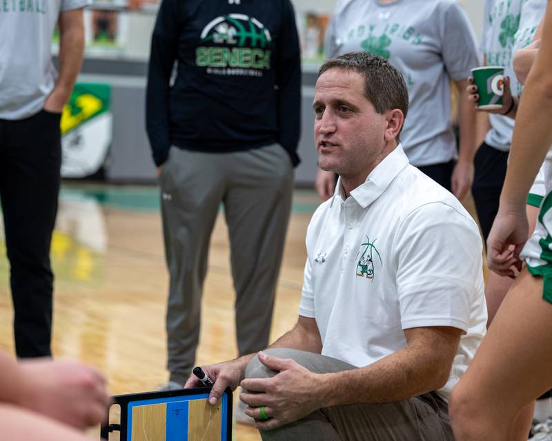 Seneca Head Coach, Josh Myers talks to team during time out on Monday, November 17, 2025 at Seneca High School in Seneca.
