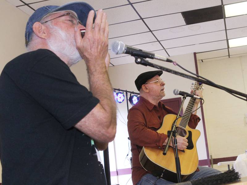 Larry Sell, of Lake Villa and Bill Liggett, of Island Lake, as the Ruddy Nickel Acoustic Duo, play original blues, jazz and folk songs during the Live 4 Life’s 9th Annual Day of Hope at the Community Center on September 17th in Fox Lake.
Photo by Candace H. Johnson for Shaw Local News Network