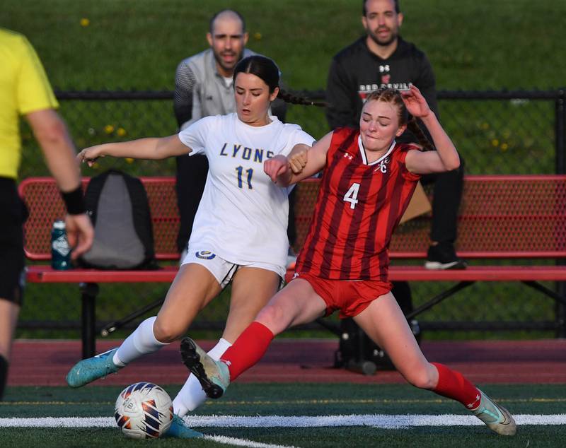 Lyons Township’s Avery Eagan (11) and Hinsdale Central’s Addisyn Krogstie (4) contend for the ball during a game on April 29, 2025 at Hinsdale Central High School in Hinsdale.
