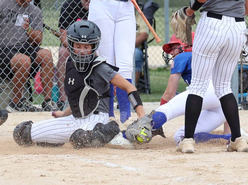 Sycos' Gianna Lovegren tags a runner out at the plate Friday, June 27, 2025, during their 16u game against Select Fastpitch in the Storm Days tournament at the Sycamore Community Sports Complex.