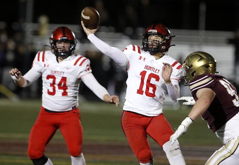 Huntley's Braylon Bower throws a pass as during a IHSA Class 8A second round playoff football game against St. Ignatius on Friday, Nov. 3, 2023, at St. Ignatius College Prep in Chicago.