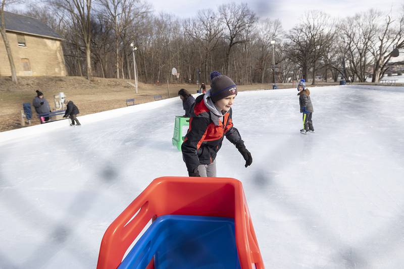 Owen Fiessinger, 10, takes a lap Saturday, Jan. 11, 2025, on the ice rink at Page Park in Dixon. The park district opened the rink late Friday.
