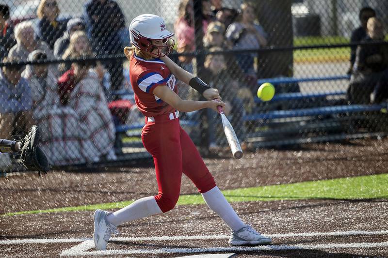 Morrison’s Isabella Duncan drives the ball over the fence to straight away center against Sterling Wednesday, April 26, 2023.