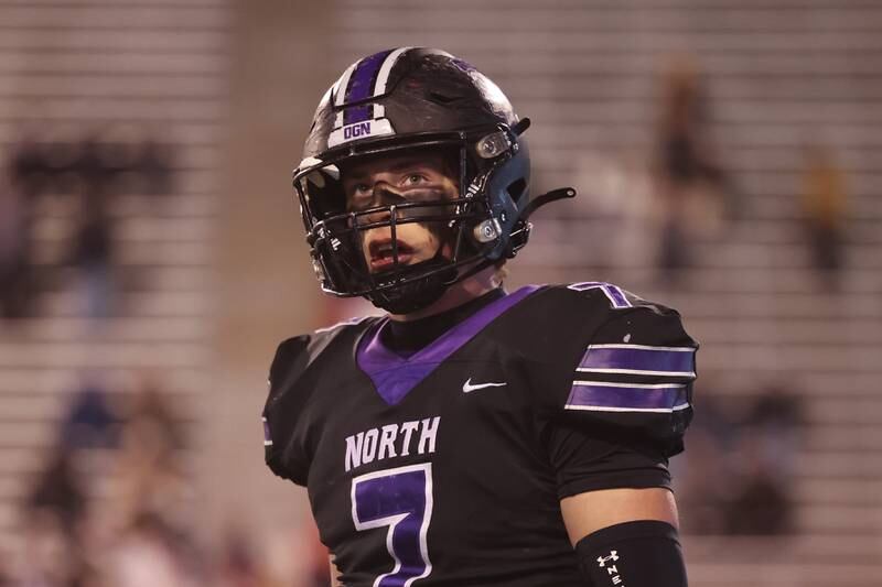 Downers Grove North’s Cael Brezina walks off the field against Mt. Carmel in the Class 7A championship on Saturday, Nov. 25, 2023 at Hancock Stadium in Normal.