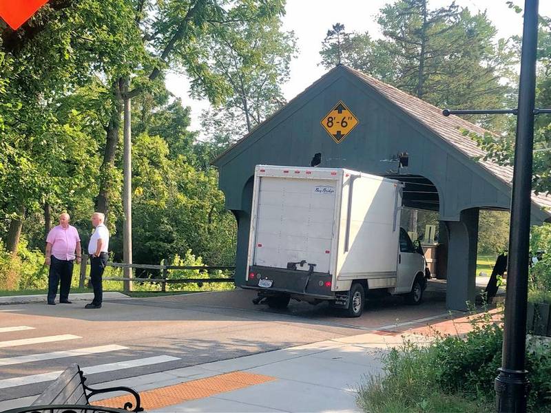 Another truck became wedged under the cover of Long Grove's iconic bridge on Thursday.