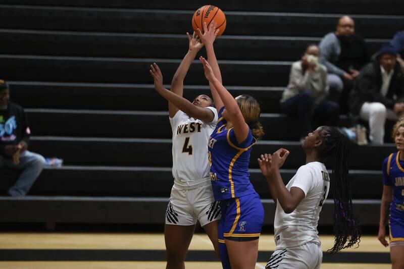 Joliet West’s Gabrielle Gavin puts up a contested shot against Joliet Central on Thursday, Jan 30, 2025 in Joliet.