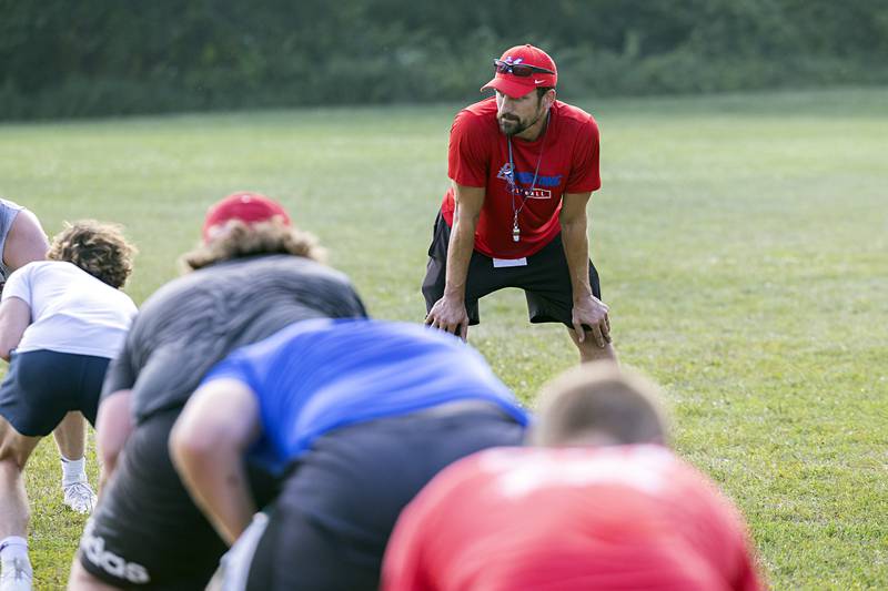The Morrison football team goes through workouts during a camp Tuesday, July 25, 2023. The Mustangs will open their season against Mendota at the end of August.