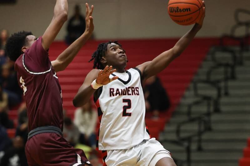 Bolingbrook’s DJ Strong lays in a shot against Lockport on Friday, February 10th.
