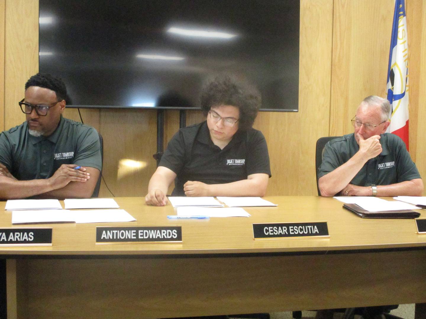 Joliet Township trustees Antione Edwards (left), Cesar Escutia (center) and Ray Slattery consider matters at a township board meeting on Tuesday. May 13, 2025