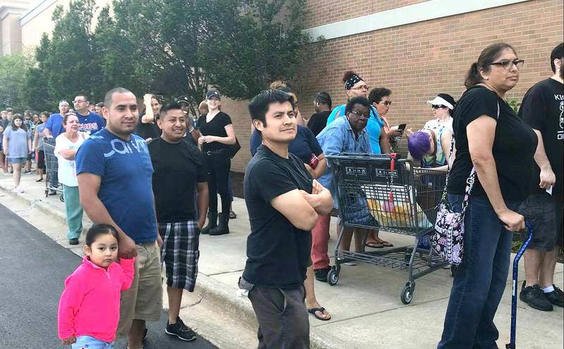 Hundreds lined up early Thursday morning for Aldi's grand opening at 2540 Sycamore Road in Northland Plaza. The store gave away golden tickets with $25 to $100 worth of store credit to the first 100 people in line Thursday.