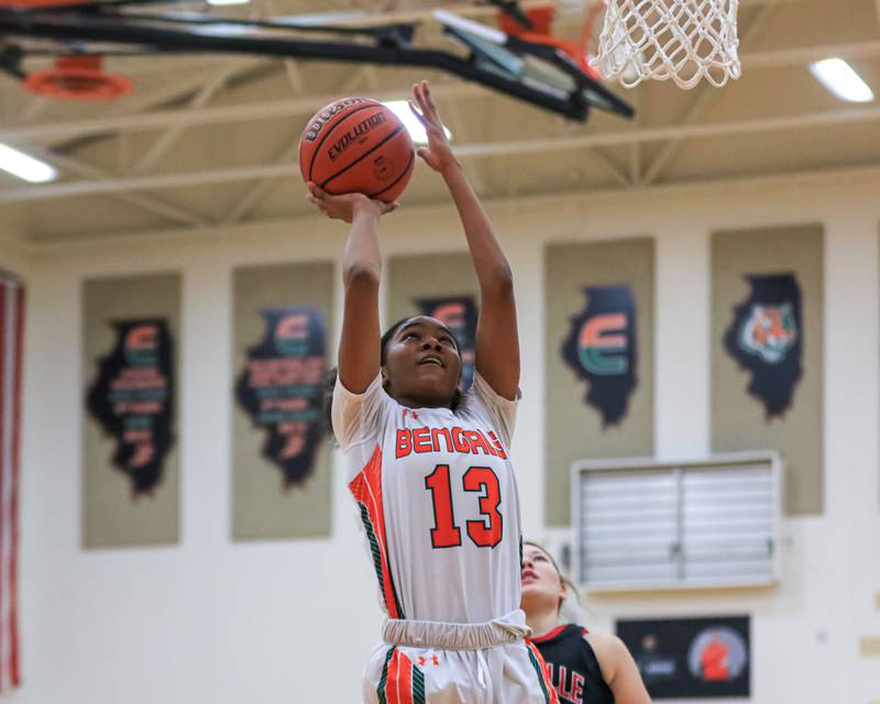 Plainfield East's Jocelyn Trotter (13) puts up a layup during varsity basketball game between Yorkville at Plainfield East.  Jan 3, 2023.