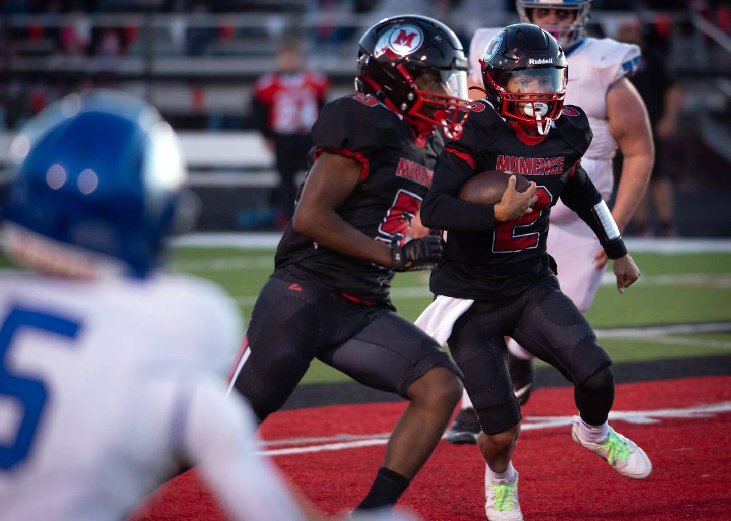Momence's Erick Castillo carries the ball during a play in a home game against Central Friday, Sept. 6, 2024.