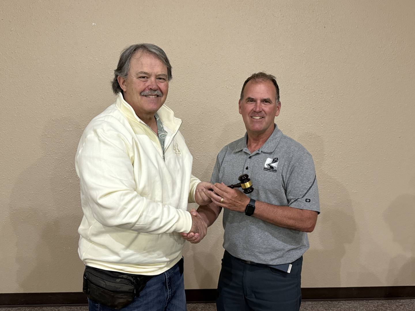 David Zinanni, outgoing president of the Bourbonnais Township Park District Board of Commissioners, and Jeff Mullinax, the board's new president, pose for a photo following the board's May 18 meeting. Zinanni will serve as Vice President under Mullinax's leadership.
