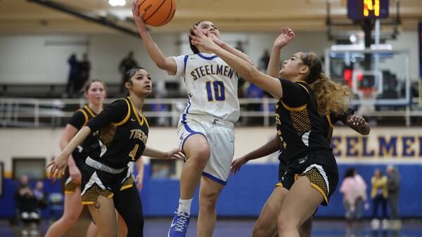 Photos: Joliet Central Rolls Past Joliet West Girls Basketball