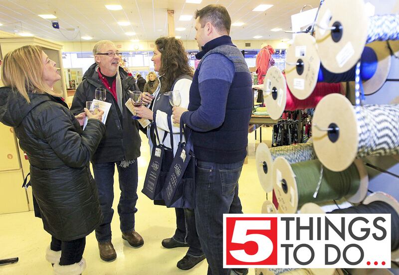 Dee Alberts, of Lake Villa, Ken Kozin, of Roselle, Krista and Linas Paul, of Round Lake, talk and drink wine at Hannah’s Home Accents during the Village of Antioch’s Winter Wine Walk on Jan. 18, 2014.