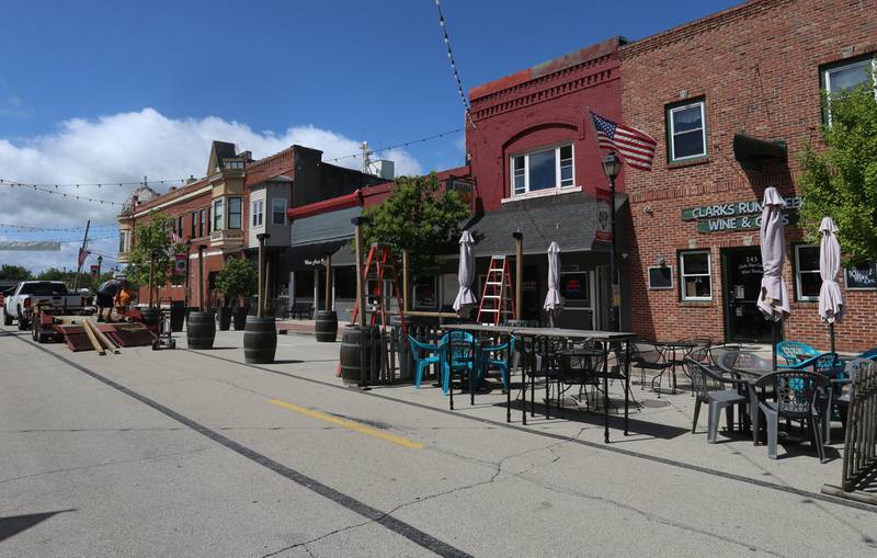 Outdoor dining is being set up on Mill Street on Tuesday, May 7, 2024 downtown Utica. Mill Street has been closed to motorists once again as tables, chairs and other patio furniture can be placed for the outdoor dining experience.