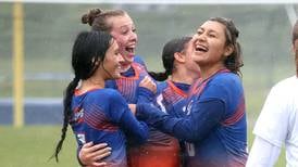 Photos: Genoa-Kingston Girls soccer wins regional title in driving rainstorm