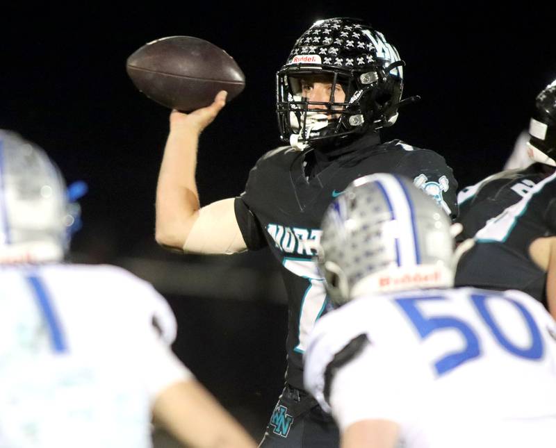 Woodstock North’s Parker Halihan fires a pass against Woodstock in varsity football at Woodstock North High School on Friday, October 24, 2025.