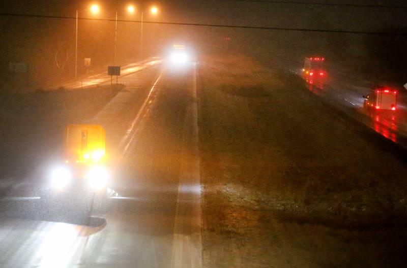 A snowplow pushes snow while traveling eastbound on Interstate 80 on Monday, Jan. 8, 2024 in Princeton.