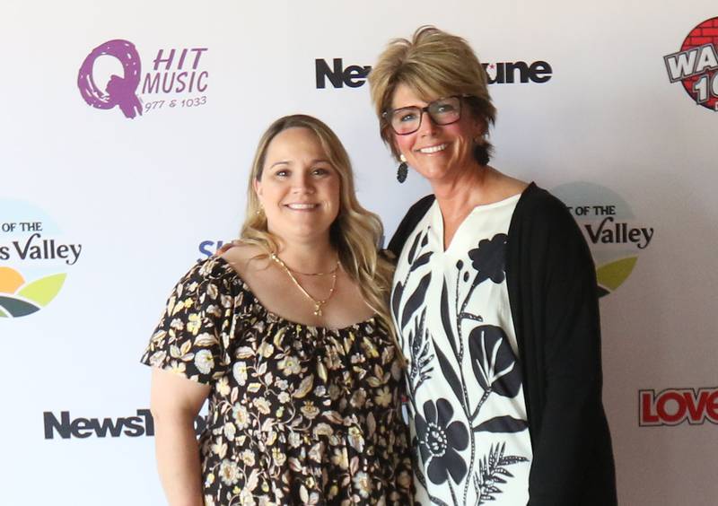 Emily Fredericks and Deanna Dullard with Ancare Veterinary Hospital, pose for a photo during the second annual Best of the Illinois Valley event on Thursday at the Auditorium Ballroom in La Salle.