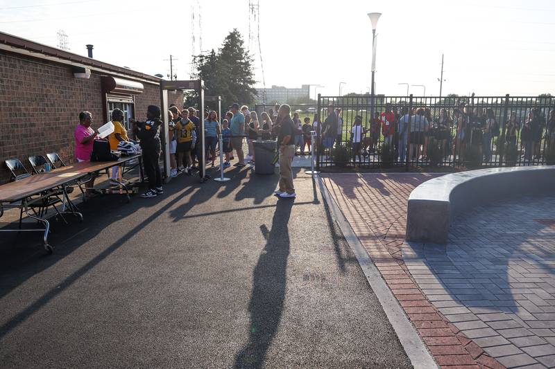 Fans line up for tickets at the first game of the season for Joliet West against Shepard on Friday, Aug. 25, 2023 in Joliet.