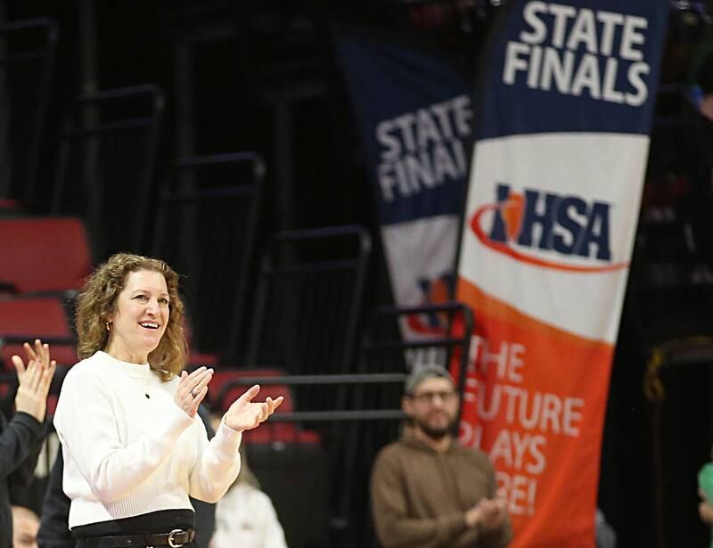 Hersey head coach Sarah Meadows applauds her team during the Class 4A third place game on Friday, March 3, 2023 at CEFCU Arena in Normal.