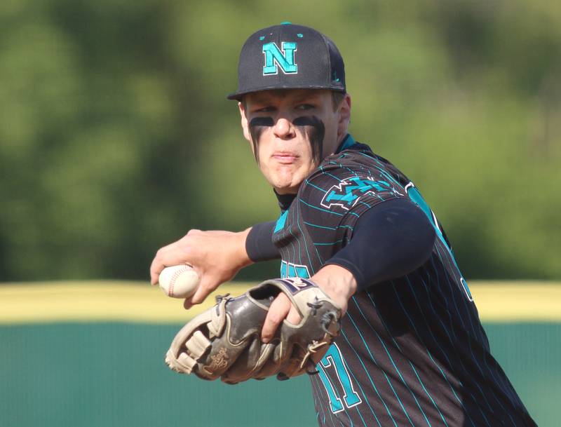 Woodstock North’s Blake Herrmann delivers against Prairie Ridge in Class 3A Regional baseball action at Cary Thursday.