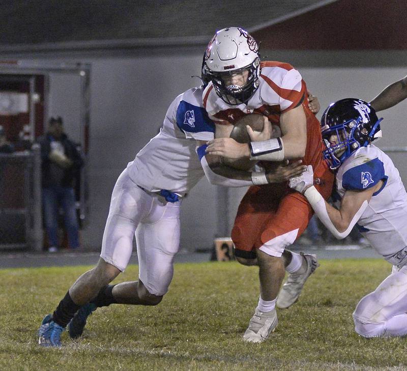 Streator's Christian Benning advances upfield on a quarterback keeper Friday, Sept. 30, 2022, at Doug Dieken Stadium in Streator.