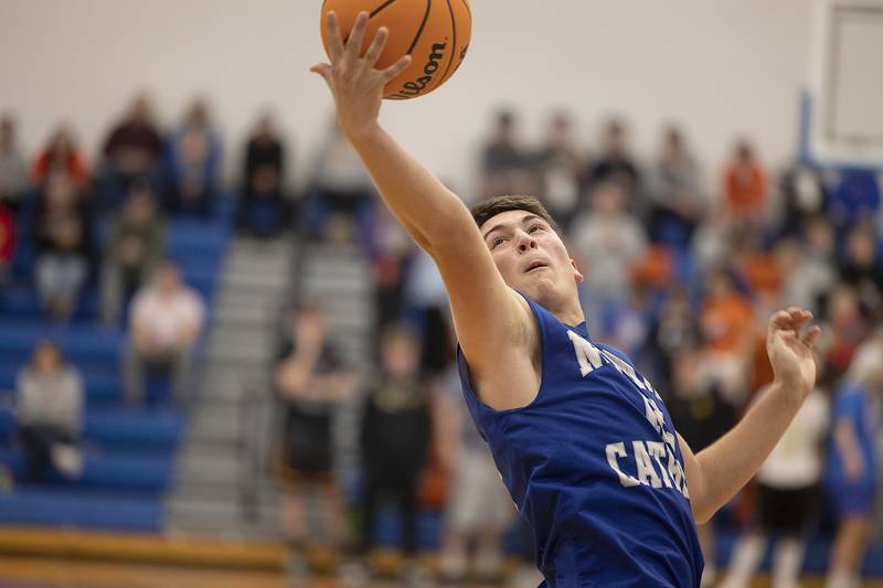 Newman’s Evan Bushman hauls in a rebound against Eastland Tuesday, Dec. 10, 2024, at Eastland High School.