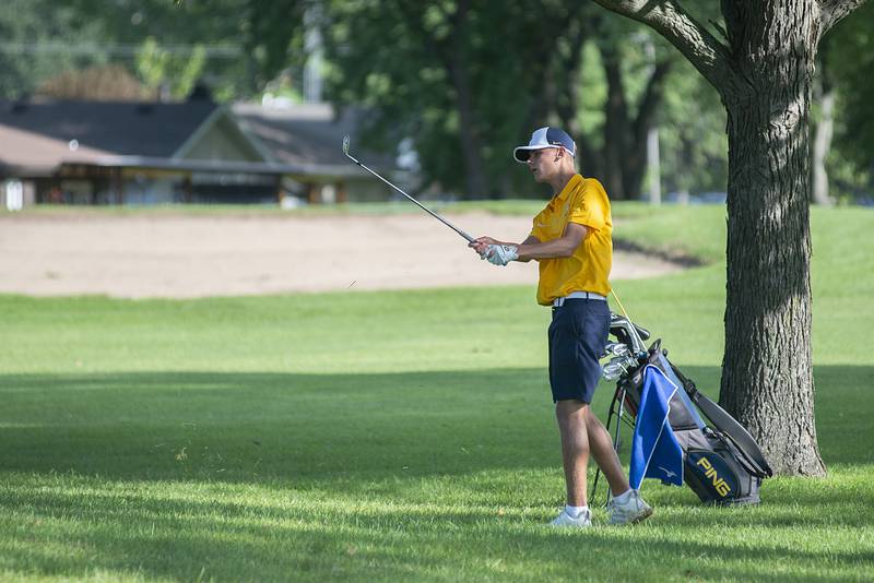 Sterling’s Mason Hubbard chips towards the green on #10 in Rock Falls Saturday, Sept. 3, 2022.