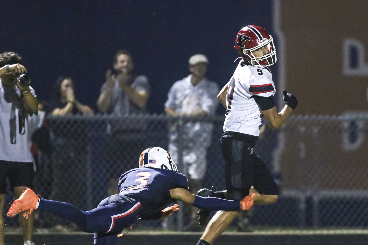 Yorkville's A.J. DiVito (9) runs in a touchdown during football game between Yorkville at Oswego Friday, Sept 26, 2025 in Oswego.