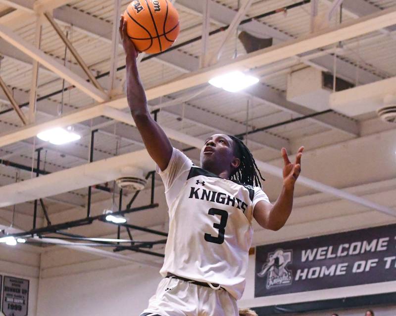 Kaneland's Marshawn Cocroft (3) makes a basket during the game on Wednesday Dec. 11, 2024, while taking on Sycamore High School held at Kaneland High School in Maple Park.