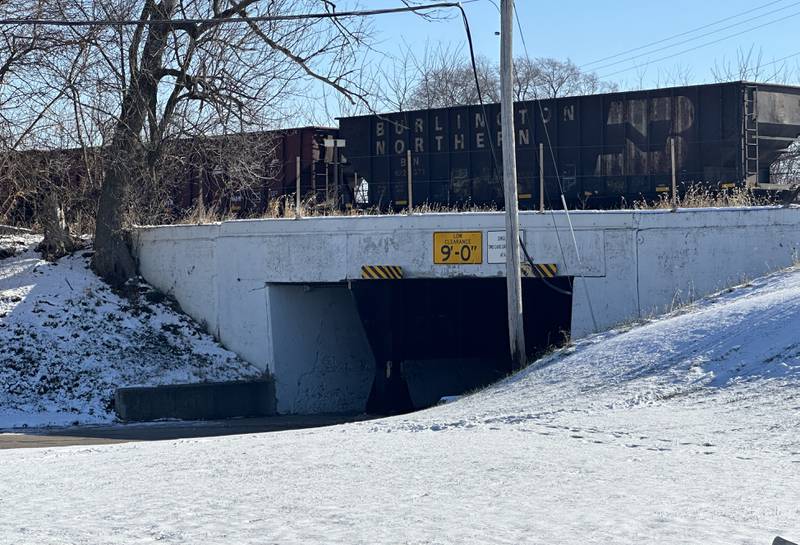 A train rests on top of the Mendota viaduct on Tuesday, Nov. 28, 2023 in Mendota. The viaduct has the shortest vertical clearance of any overpass in the Illinois Valley at only nine feet.