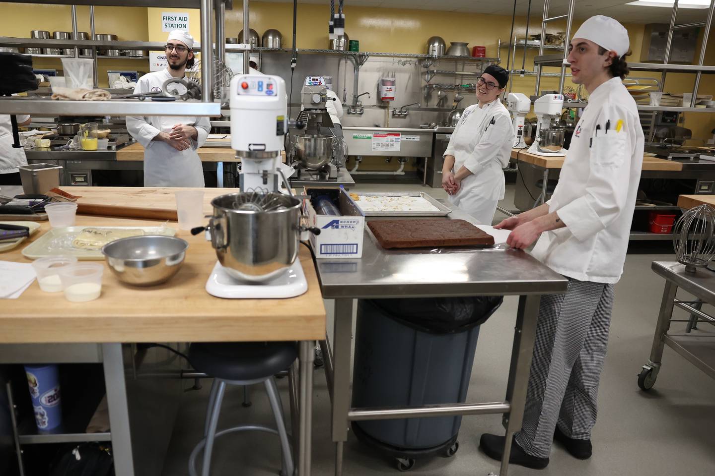 Student Jac Sayegh (left), Gena Shaw and Than Petrakis attend one of Chef Andy Chlebana pastry classes at the Joliet Junior College City Center Campus on Wednesday, March 1st, 2023. Andy has won numerous awards, including 1st place in two competitive television series on the Food Network.