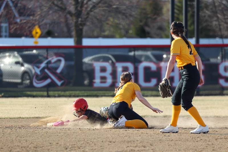 Bradley-Bourbonnais' Shannon Lee evades a tag at second base during the Boilermakers' 12-0 victory over Marian Catholic on Tuesday, March 18, 2025. Hammond struck out 12 batters across five shutout innings.
