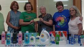 DeKalb church group donates to District 428 school food pantry