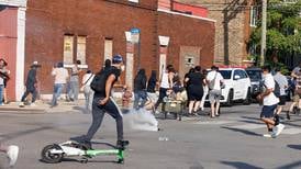 Using helicopters and chemical agents, immigration agents become increasingly aggressive in Chicago