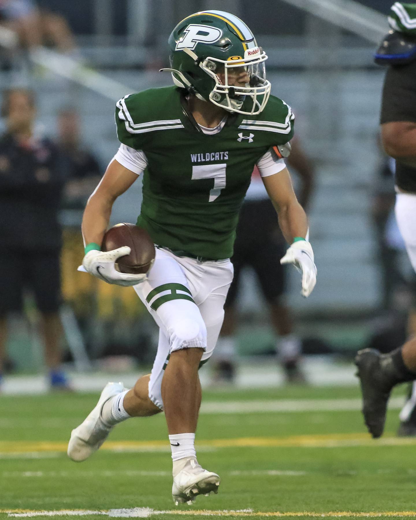 Plainfield Central's DJ Pearson (7) carries the ball during football game between Plainfield Central vs Yorkville.  Sept 2, 2021.  Gary E Duncan Sr. for Shaw Local.