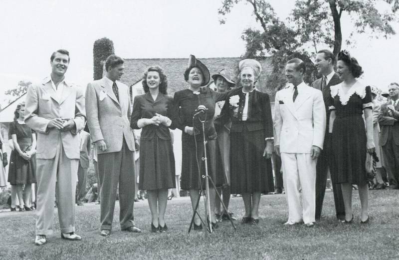 At Hazelwood in 1941, Myrtle Walgreen posed with Hollywood celebrities (from left) George Montgomery, Ronald Reagan, Ann Rutherford, Louella Parsons, Mabel Shaw of the Telegraph (in back), Myrtle Walgreen, Joe E. Brown, Ben Lyon (in back), and Bebe Daniels.