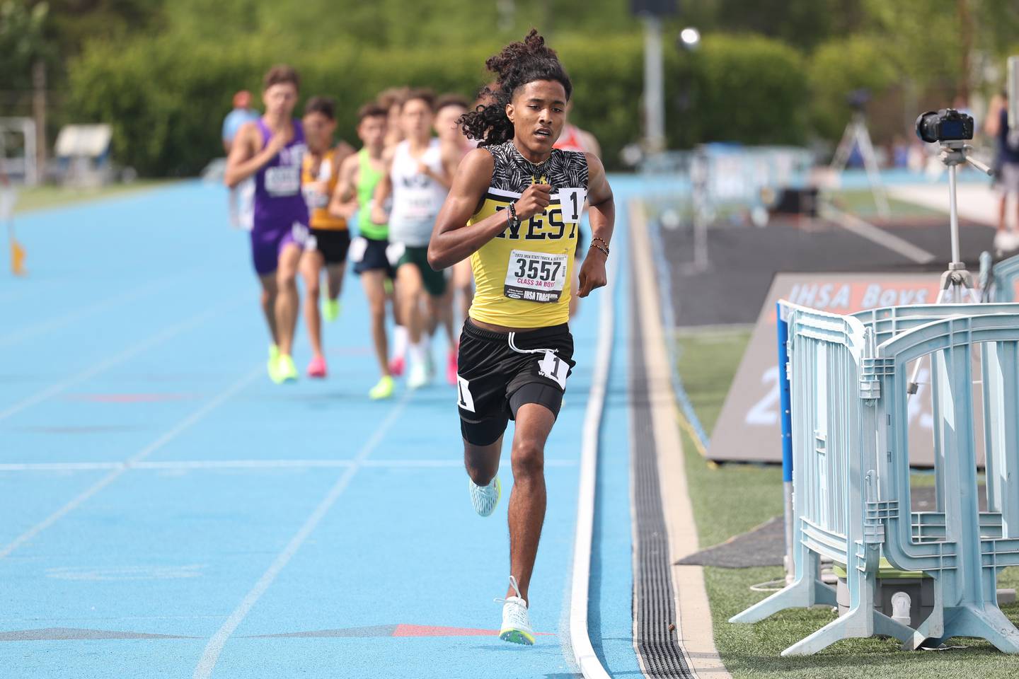 Joliet West’s Marcellus Mines holds the lead midway in the Class 3A 1600 Meter Run State Finals on Saturday, May 27, 2023 in Charleston.