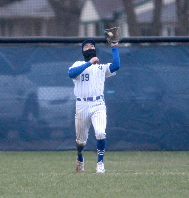 Geneva's Noah Hallahan makes a catch in the outfield during a game against Waubonsie Valley on Wednesday, April 9, 2025 in Geneva.