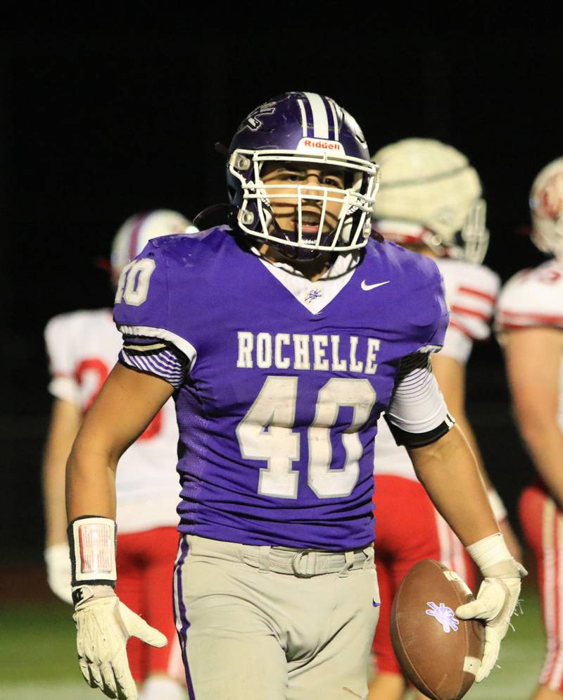 Rochelle's Roman Villalobos reacts after carrying the ball during Friday's game with Ottawa in Rochelle.